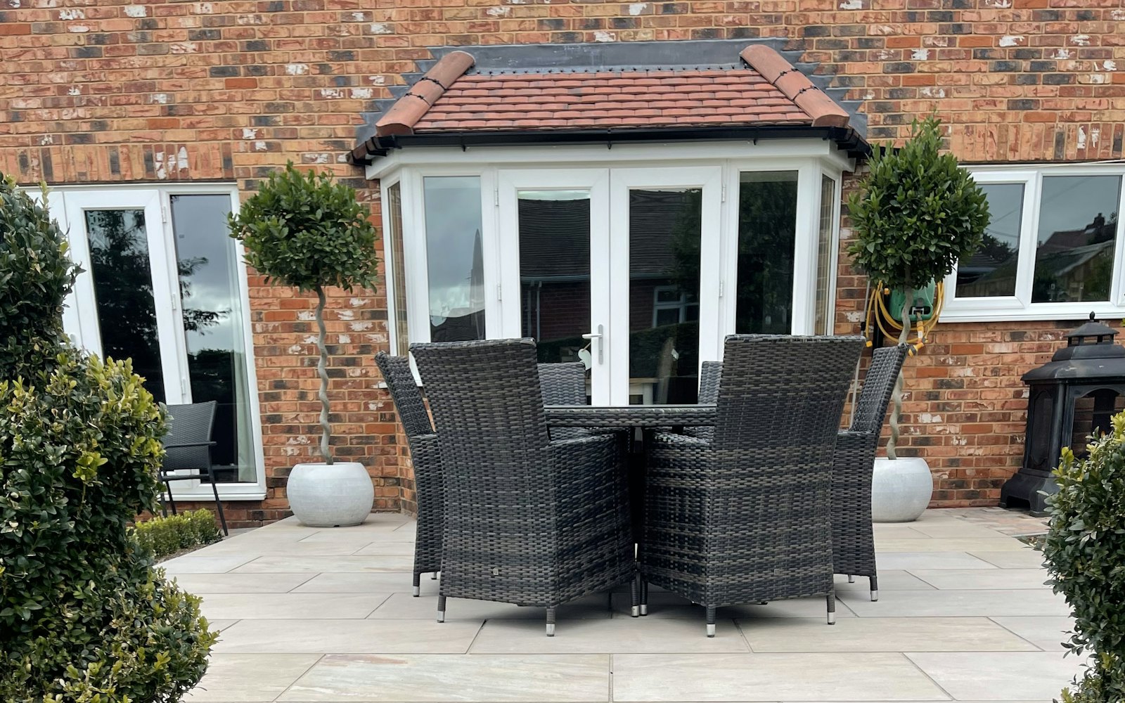 Garden patio with table and chairs
