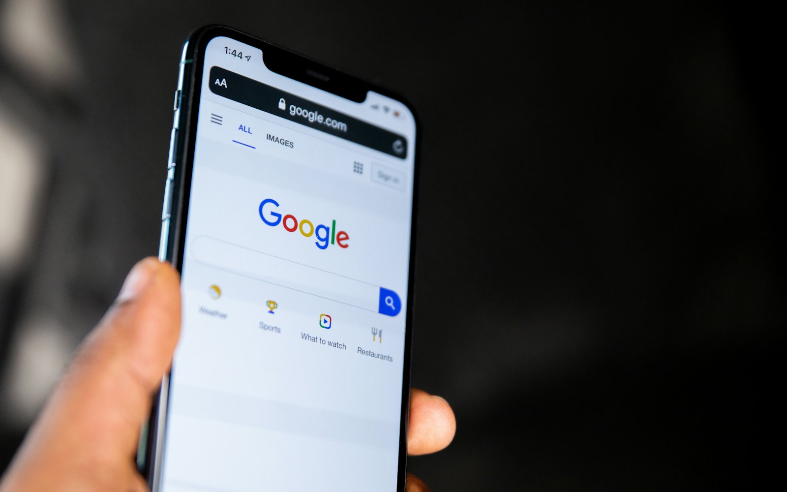 Phone showing the Google search homepage